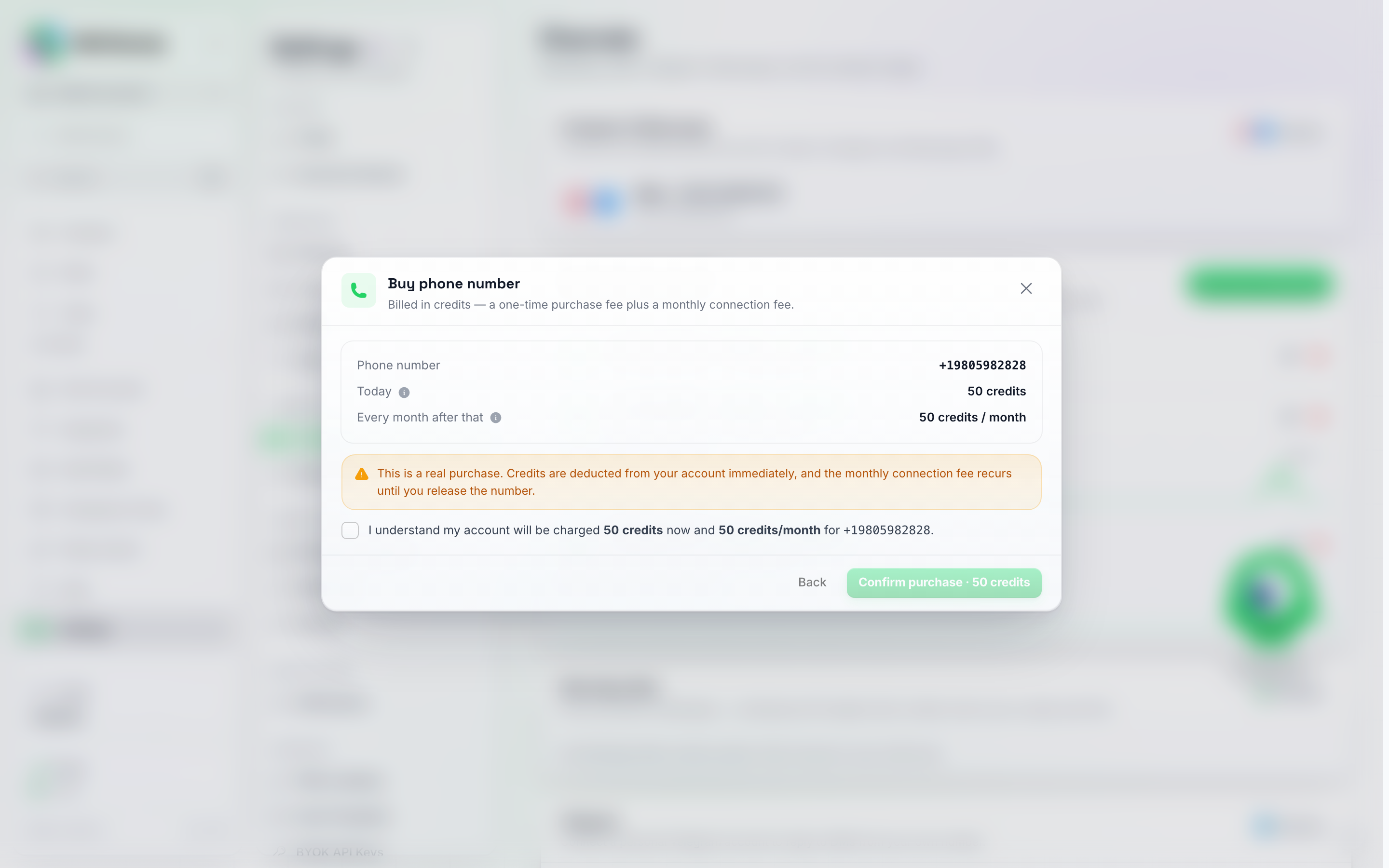 La schermata di riepilogo dell'acquisto del numero di telefono che mostra il numero di telefono, i crediti addebitati oggi, il costo mensile in crediti successivo, un avviso di acquisto reale e una casella di controllo di riconoscimento non selezionata accanto a un pulsante Conferma acquisto